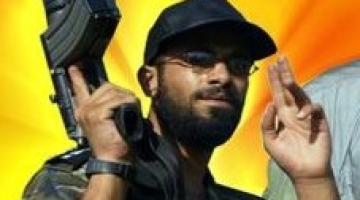 والدة الشهيد "حسن المدهون" تطالب بمحاكمة المتورطين من السلطة في اغتيال ابنها