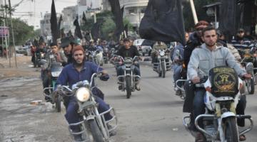 بالصور.."الجهاد" ينظم مسيراً بالدراجات النارية برفح