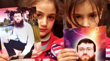 إضاءة شموع واعتصام تضامني مع الشيخ خضر عدنان بالخليل