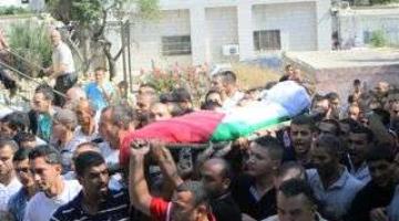 تشيع جثمان الشهيد "أكرم بدر" من قرية بيتللو غرب رام الله