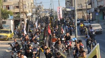 الجهاد تنظم عرضاً بالدرجات النارية بخان يونس