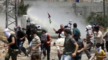 اعتقال 4 شبان جنوب الضفة وإحراق مركبة ببيت أمر