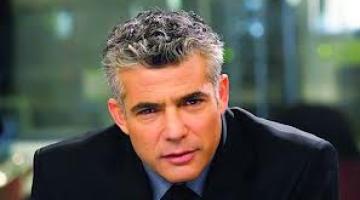 لبيد: حان وقت طلاق الفلسطينيين