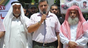 بالصور.. الجهاد تنظم سلسلة بشرية تضامناً مع الأسرى