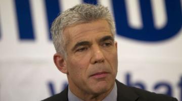 لابيد: سنصوت ضد قانون منع الأذان