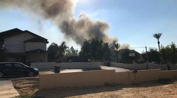 14 حريقاً في أحراش "غلاف غزة" بفعل بالونات حارقة
