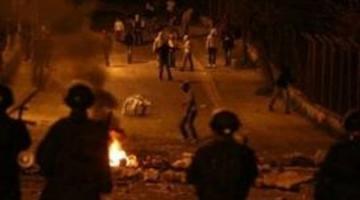 مواجهات عنيفة بالعيسوية لمنع مصادرة ارض فلسطينية