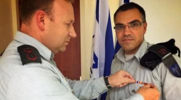 جيش الاحتلال يمنح الناطق باسمه وسام "الجرف الصامد"