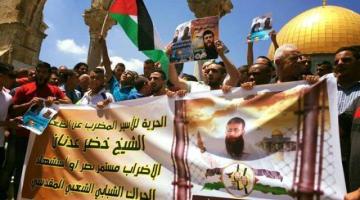 صور.. مسيرات حاشدة في القدس والخليل تضامناً مع الشيخ خضر عدنان