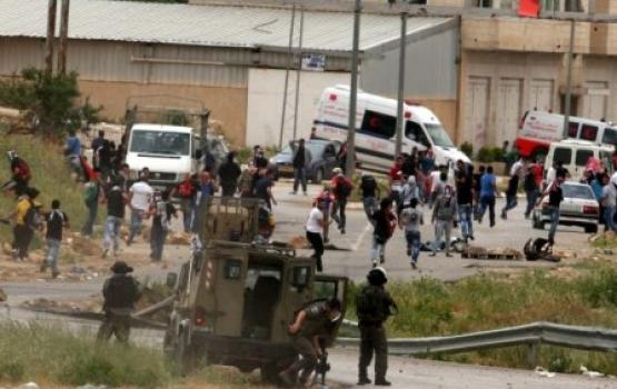 إصابة العشرات بمواجهات عقب تشييع جنازة شاب في بيت أمر